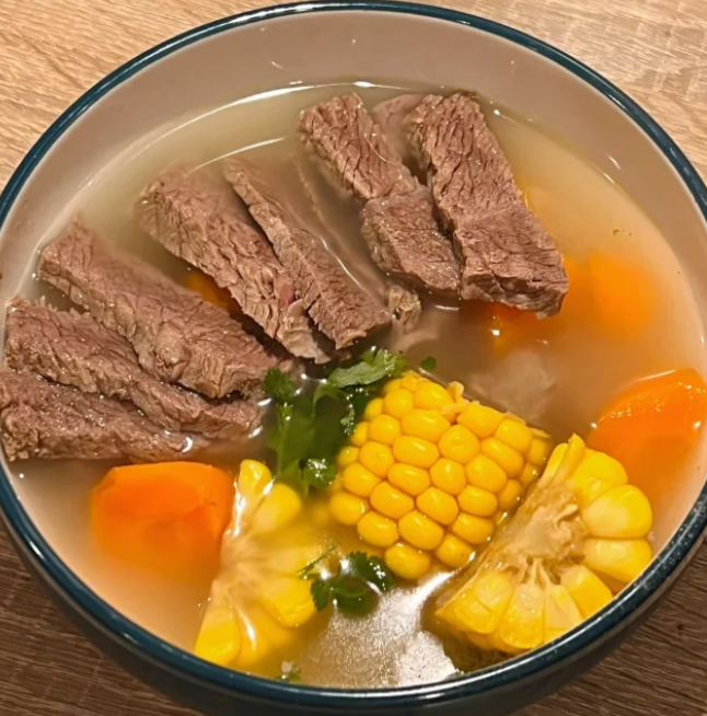 ţ